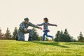 Soldier meet his daughters outdoor.