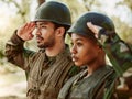 Soldier, military and man and woman salute in nature for service, protection and battle outdoors. War training, national