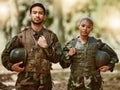Soldier, military and portrait of man and woman in gear in nature for service, protection and training outdoors Royalty Free Stock Photo