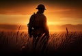 A soldier in military uniform stands among the golden spikelets of a wheat field at sunset. AI Generated