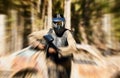 Soldier, paintball and running with gun for intense battle or war in the forest pushing to attack. Active paintballer Royalty Free Stock Photo