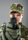 Soldier with pistol aiming Royalty Free Stock Photo