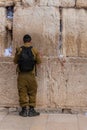 Soldier praying at Western Wall, Jerusalem, Israel Royalty Free Stock Photo