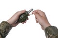 Soldier pulling safety pin out of hand grenade on white background, closeup Royalty Free Stock Photo