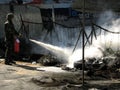 Soldier putting out fire