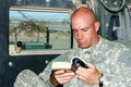 A soldier reading Royalty Free Stock Photo