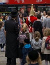 Soldier of Royal Horse Guards in London, surrounded by tourists including Jewish family in foreground