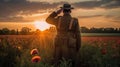 Soldier salutes standing in poppy field during sunset. Remembrance Day created with generative AI technology Royalty Free Stock Photo