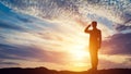 Soldier saluting at sunset. Army, salute, patriotic concept Royalty Free Stock Photo