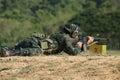 Soldier is shooting rifle Royalty Free Stock Photo