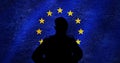 Soldier Silhouette In Military Beret Facing Grunge Style European Union EU National Flag