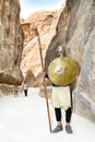 Soldier with spear guards roadway in Petra