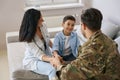 Soldier spending time with his family at home