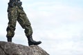 Soldier stand on the rock in nature Royalty Free Stock Photo