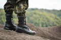 Soldier stand on the rock in nature Royalty Free Stock Photo