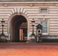 Soldier standing guard at Buckingham Palace in London, United Kingdom