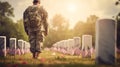 A soldier standing in solidarity with fallen soldiers at a cemetery commemorate Memorial Day