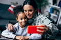 Soldier taking selfie with daughter