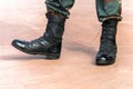 Soldier on the top of a mountain Army boots. Royalty Free Stock Photo