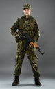 Soldier in uniform with machine gun