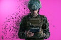 Soldier using tablet computer closeup pixelated