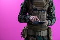 Soldier using tablet computer closeup