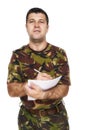 Soldier who writes something on paper Royalty Free Stock Photo