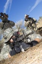 Soldiers Aiming Machine Guns