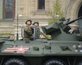 Soldiers on armored personnel carrier BTR-82A during a military parade dedicated to the Victory Day.