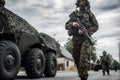 Soldiers and armored vehicles enter the city