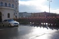 The soldiers of the Austrian army on the guard of honor lead by passing government vehicles. One of the entrances to the Hofburg P