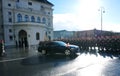 The soldiers of the Austrian army on the guard of honor lead by passing government vehicles. One of the entrances to the Hofburg P