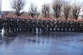 The soldiers of the Austrian army on the guard of honor lead by passing government vehicles. One of the entrances to the Hofburg P