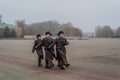 Students and soldiers marching and paying tribute Royalty Free Stock Photo