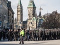 Soldiers from Canadian Army, men and women from the Royal Canadian navy wearing remembrance poppy