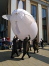 soldiers carry the airship