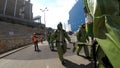 Soldiers carry stretchers to help injured person