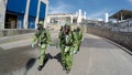 Soldiers carry stretchers to help injured person