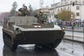 Soldiers of Czech Army are riding armored ambulance vehicle on military parade