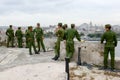 Soldiers enjoying the view from La Cabana fortress at Havana