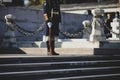 Soldiers guard the eternal flame for the army heroes during a military ceremony in Bucharest, Romania, at the Tomb of the Unknown