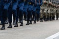 Soldiers marching on street during parade