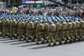 Soldiers paratroopers marching on a square during military parade