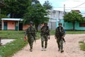 Soldiers patrol the city La Macarena