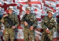 Soldiers posing. Georgian flag. Tbilisi. Georgia. Royalty Free Stock Photo