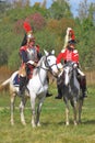 Soldiers-reenactors ride horses. Royalty Free Stock Photo