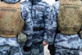 Soldiers of russian guard wearing military uniform and armored jacket