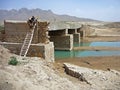 Soldiers searching a bridge in Afghanistan