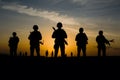 Soldiers Silhouettes In Sunsets Sentinels Resonate Under Evening Glow