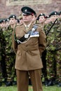 Soldiers stand to atention a the rememberance Day